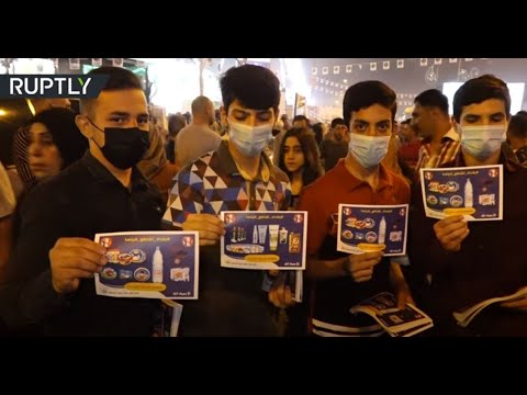 شاهد آلاف المتظاهرين يُطالبون بحظر المنتجات الفرنسية في بغداد